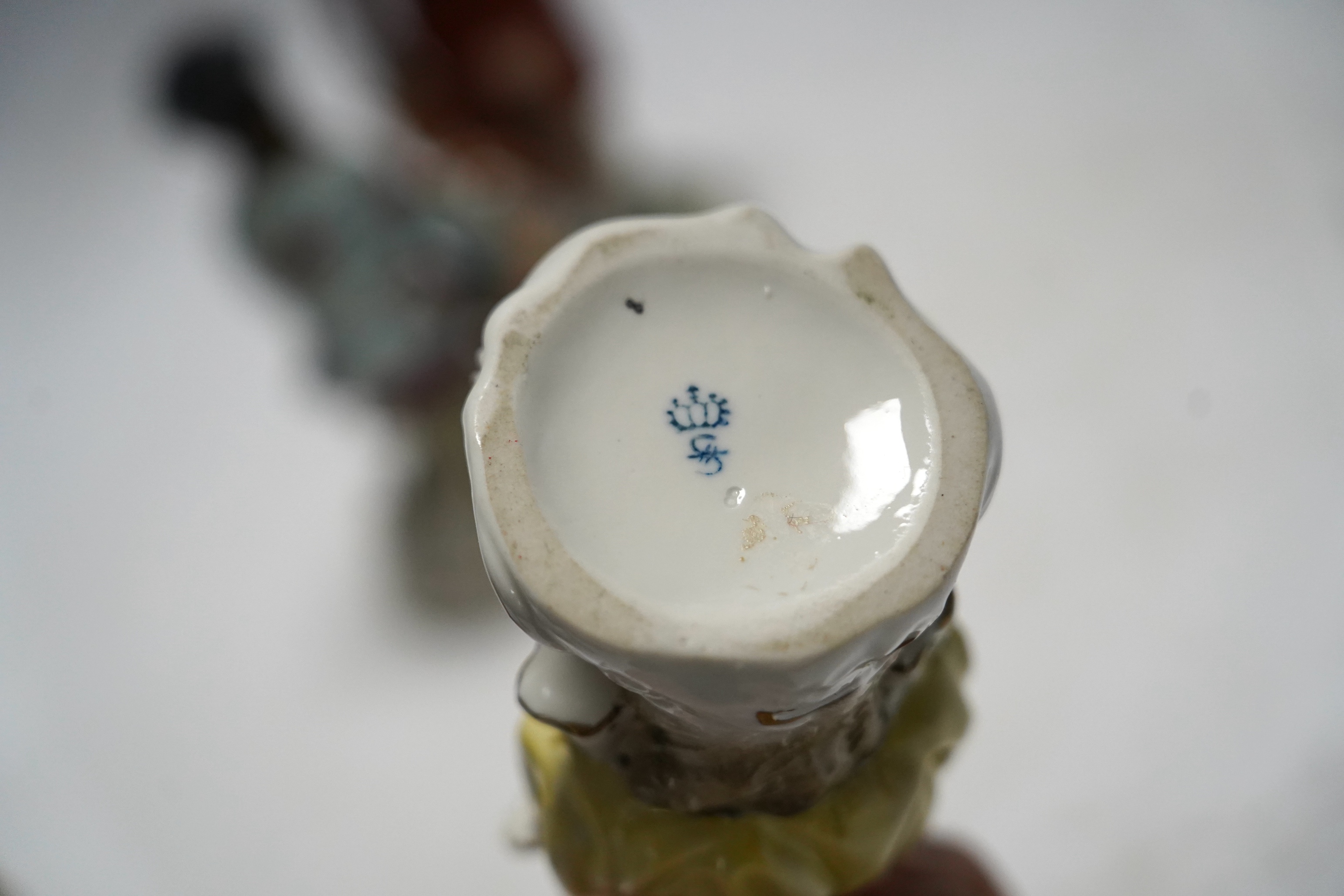 Three Dresden and two Sitzendorf porcelain figures, tallest 20cm